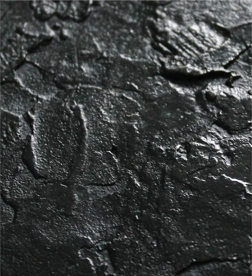 Patine noire sur bronze